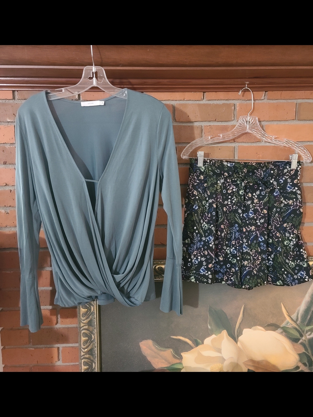 Lush Sage Green Draped Wrap Top with Black Floral Shorts